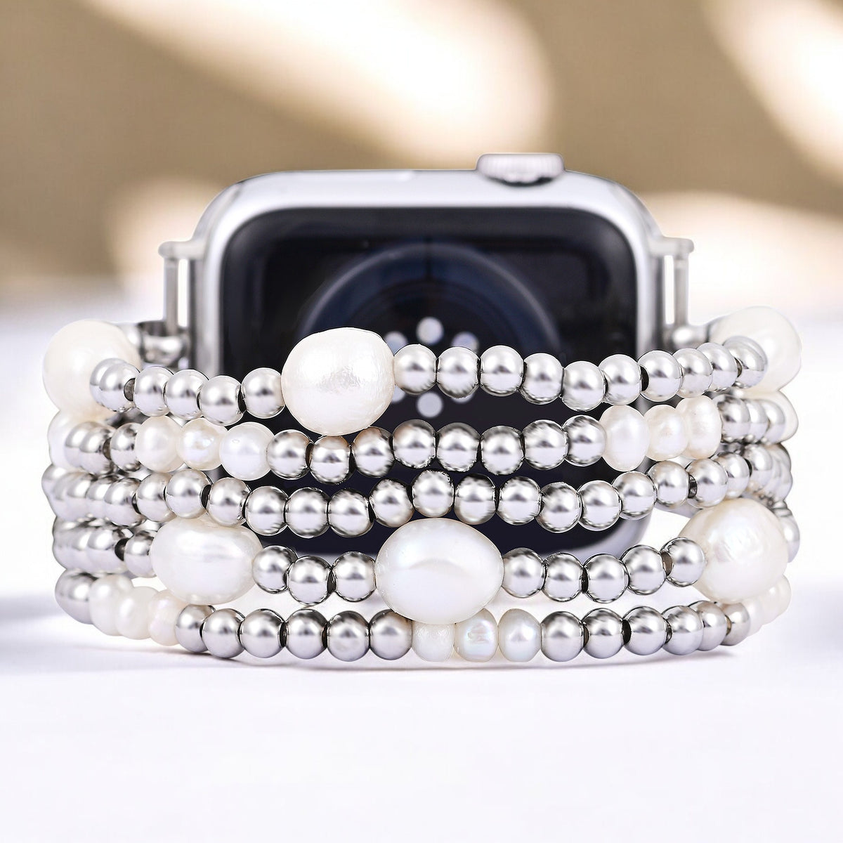 Perlen- und silberfarbener Stretch-Apple Watch-Armband