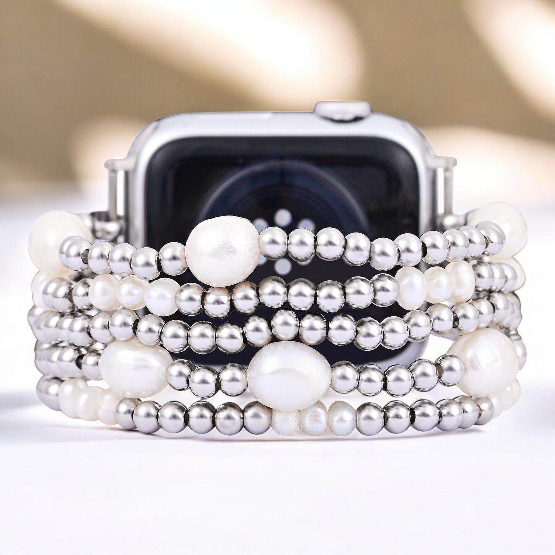 Perlen- und silberfarbener Stretch-Apple Watch-Armband