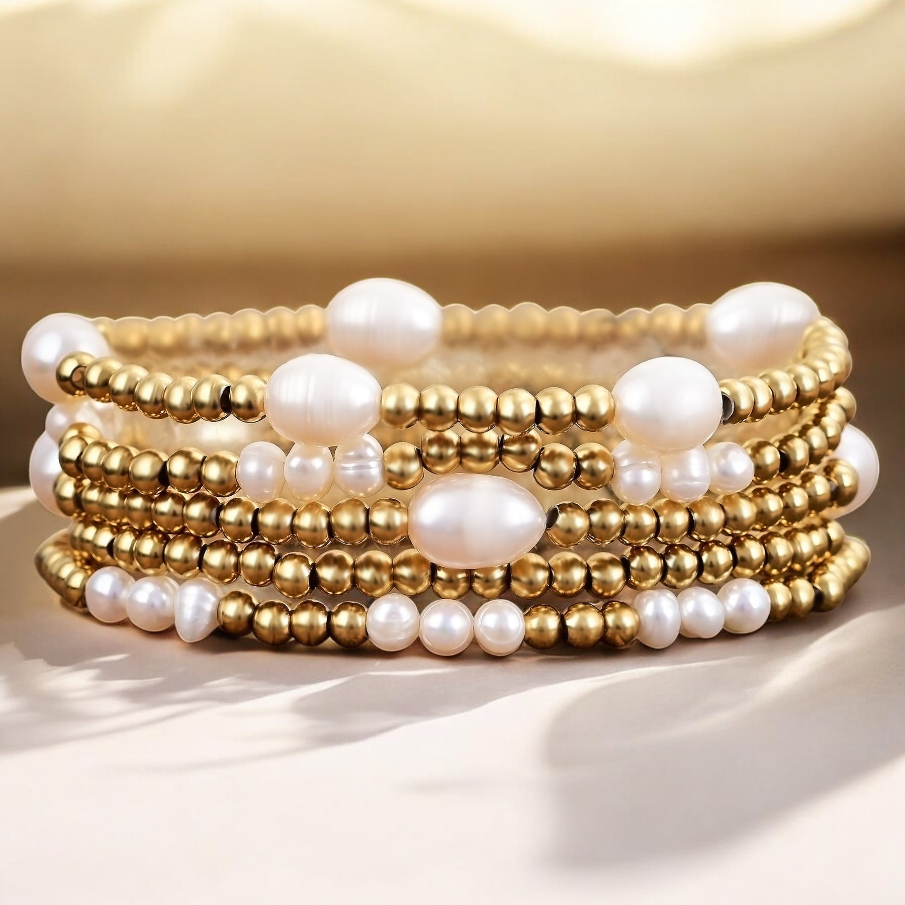 Gold- und Perlenarmband-Set