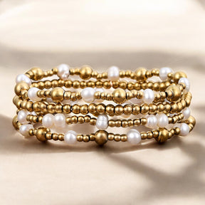 Gold schimmerndes Perlenarmband-Set